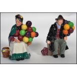 A pair of Royal Doulton ceramic figurines Old Balloon Seller HN1315 (HN 1315) and Old Balloon Man