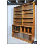 A large 1970's teak wood lawyers / barristers  stacking library bookcase cabinet having a