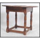 An unusual carved oak Victorian centre table being raised on block and turned legs with peripheral
