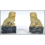 A pair of Chinese Jade temple dogs being mounted o