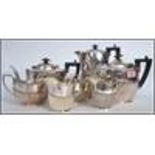 An early 20th century silver plate 4 piece tea and coffee service by Levesley Brothers comprising