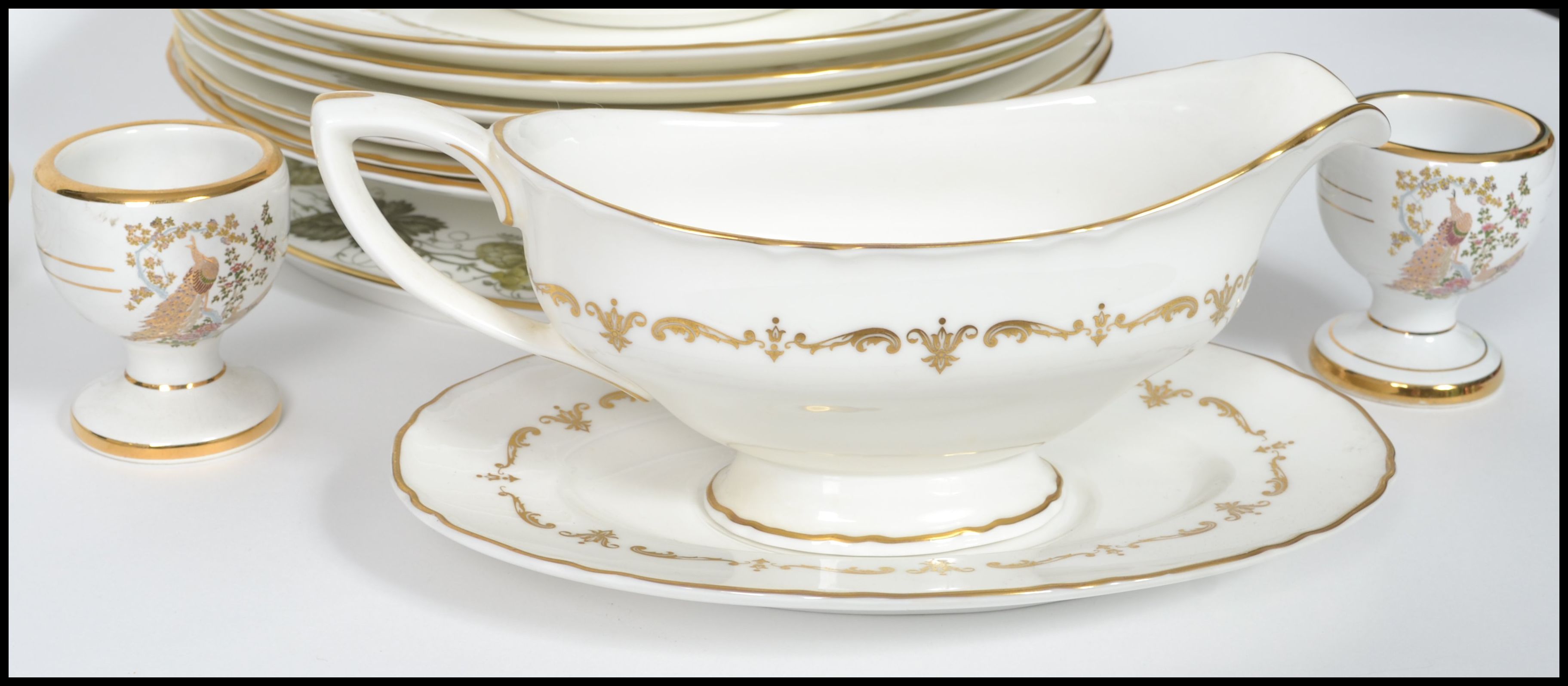 A part bone china gilt decorated on white ground dinner service by Royal Worcester consisting of - Image 4 of 9