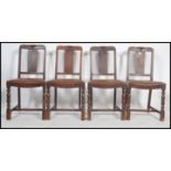 A set of 4 1930's Art Deco dining chairs being raised on block and turned legs united by