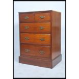 An early 20th century mahogany chest of drawers being raised on a plinth base having short drawers