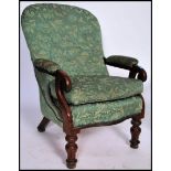 A good Victorian mahogany library armchair in maho