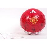 An original Manchester United 2016/17 squad official signed football. Each autograph in black