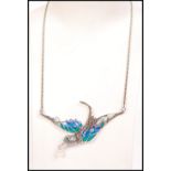 A fabulous Art Nouveau style ladies plique a jour necklace in the form of a bird with pearl to the