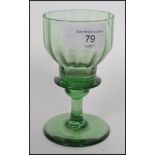 A superb Georgian Bristol green wine glass c1820 with a rib moulded double ogee bowl with blade