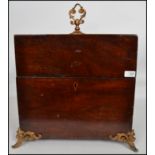 A 19th century large mahogany cellarette, fitted with  liner and sectional dividers, having a hinged