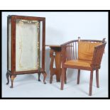 A small china display cabinet raised on cabriole legs together with a Windsor style chair and an