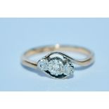 A hallmarked 9ct gold and platinum diamond three stone ring. Marked 9ct & Plat. Size N. Weight 2.2g.