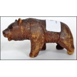 An early 20th century carved Black Forest bear sta