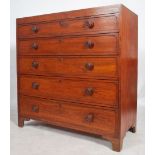 A 19th century Victorian oak straight bank chest of drawers consisting of 5 long straight drawers