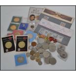 A collection of items to include vintage coins, enamel badges, stamps etc please see images.