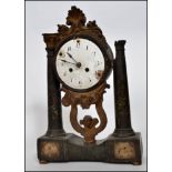 A 19th century Italian portico clock raised on a marble twin column stand with barrel movement and