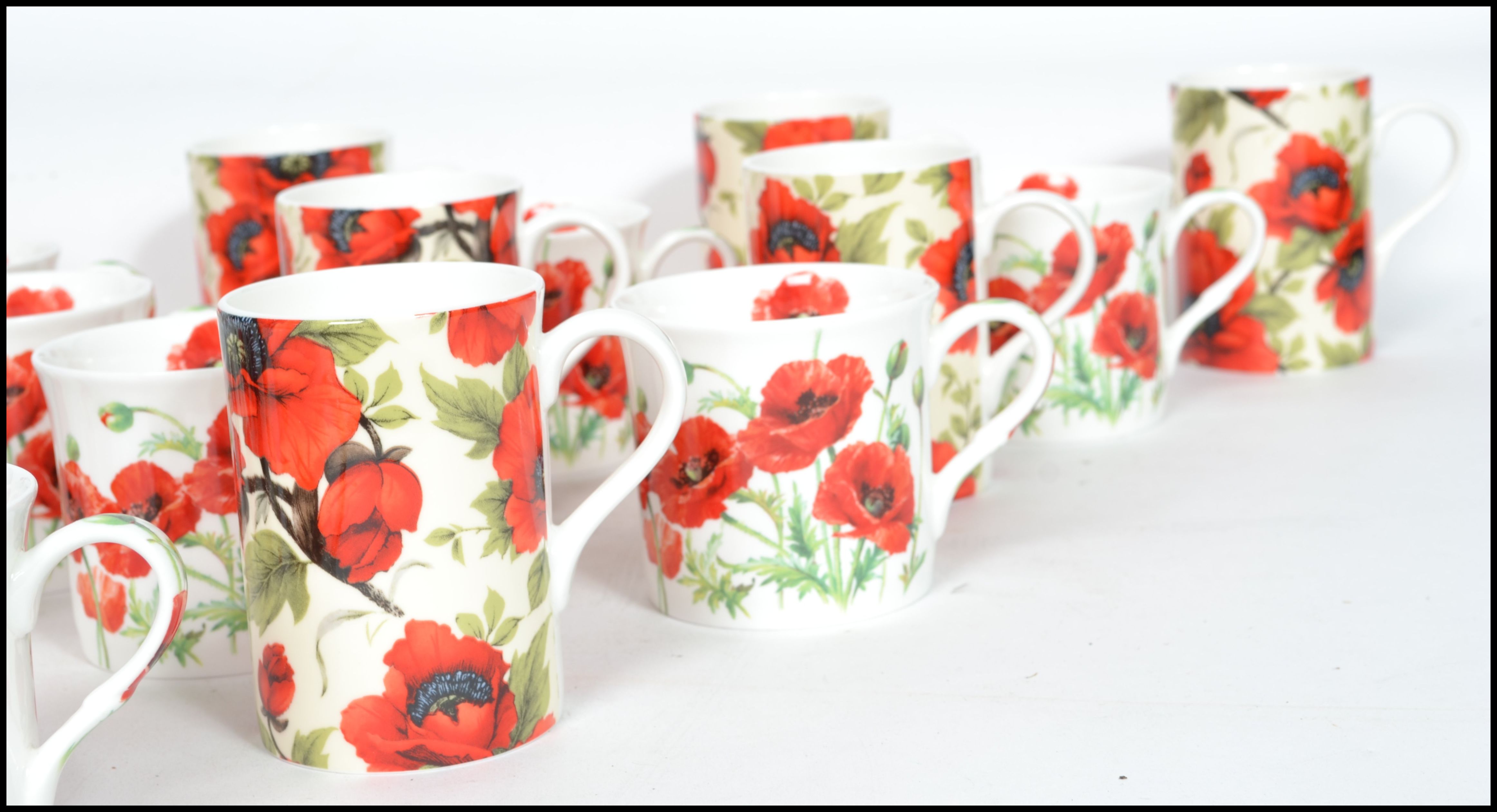 A good group of ceramic twelve coffee cups and 10 tea cups all with poppy flower design. Makers - Image 5 of 9