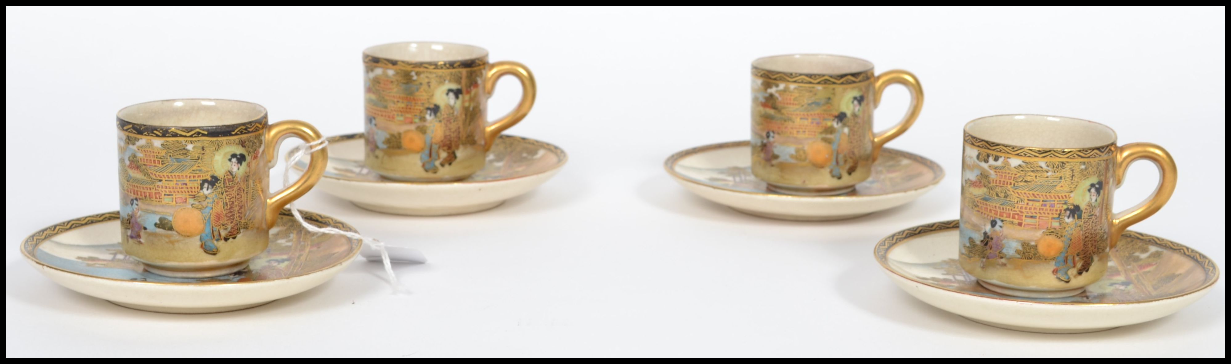 A matching set of four 19th century Oriental Meiji period Japanese Satsuma coffee cups / cans and