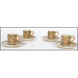 A matching set of four 19th century Oriental Meiji period Japanese Satsuma coffee cups / cans and