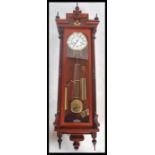 A Franz Hermle large Vienna style wall clock model 241-840 with Masonic symbol to front, three