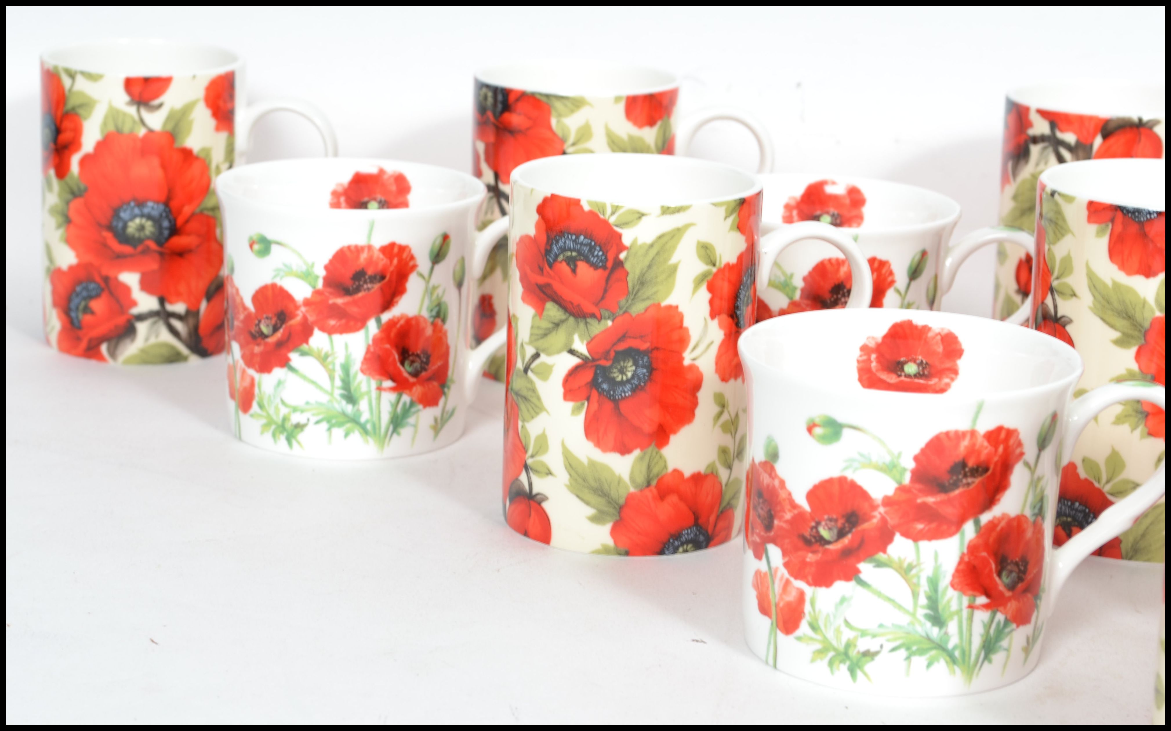 A good group of ceramic twelve coffee cups and 10 tea cups all with poppy flower design. Makers - Image 3 of 9