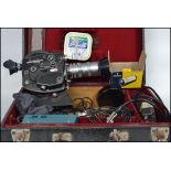 A vintage original early 20th century Beaulieu cine camera complete in the original case being