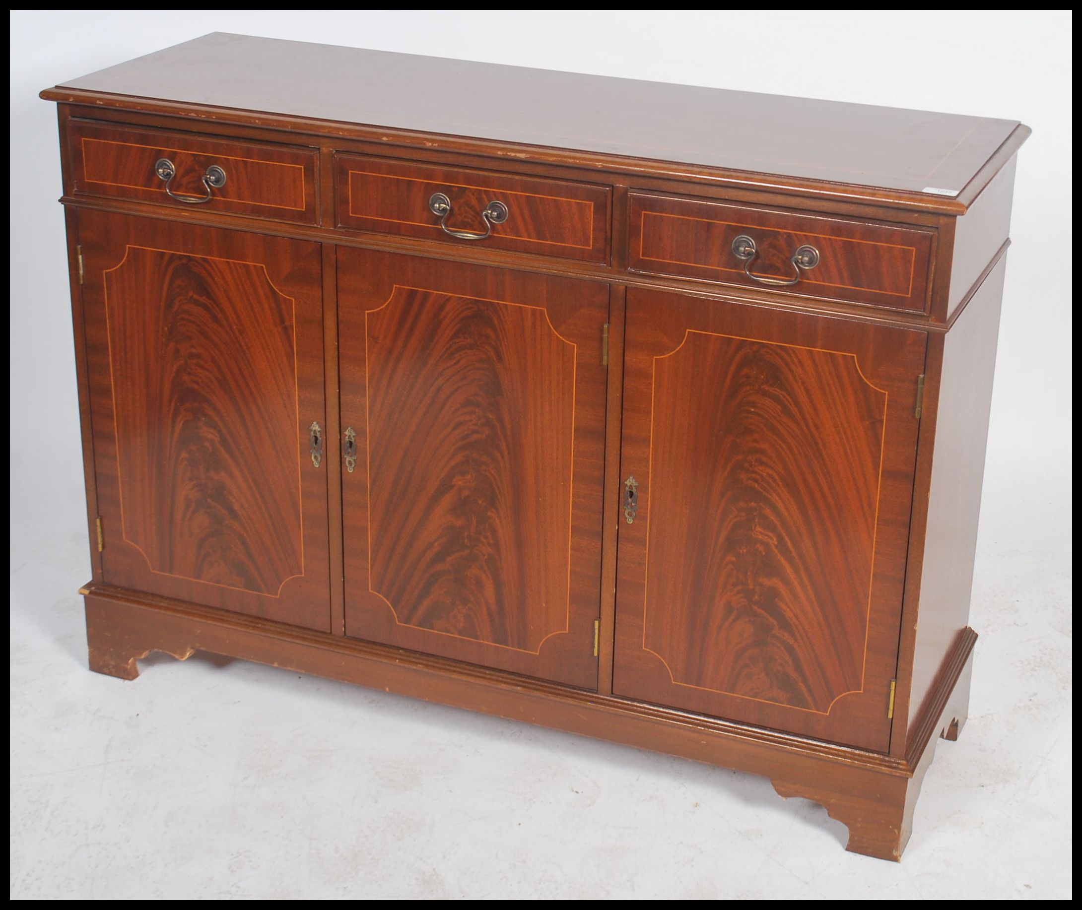 A Georgian style mahogany inlaid sideboard of small proportions being raised on a plinth base with - Image 2 of 4