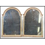 A good pair of Regency revival wall mirrors circa mid 20th century having arched tops with painted