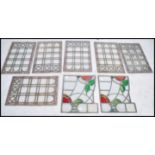 A group of 19th century stained glass lead framed panels to include 6 matching plain panels with