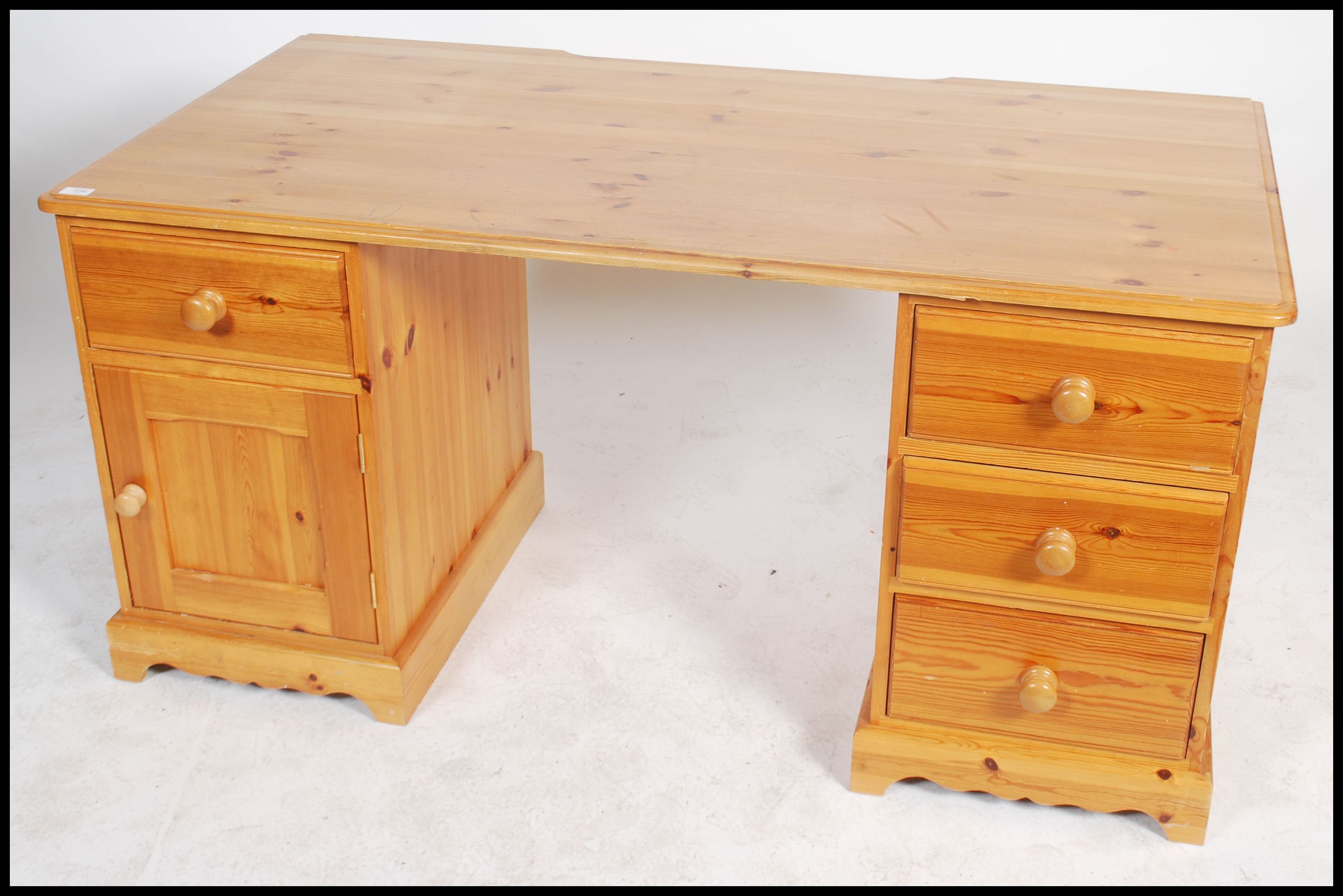 A 20th century contemporary twin pedestal pine knee hole desk having an arrangement of drawers - Image 2 of 5