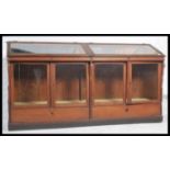 An impressive 20th century large Italian shop / museum display cabinet.  Of large form with mirror