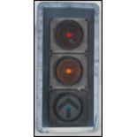 A large set of Industrial traffic lights complete with the blinker hoods and raised on tall