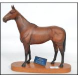 A good 20th Beswick model of ' Arkle ', from the connoisseur range with name card reading Champion