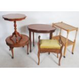 A collection of furniture to include a 1920's oak barleytwist trolley, a mahogany pedestal lamp