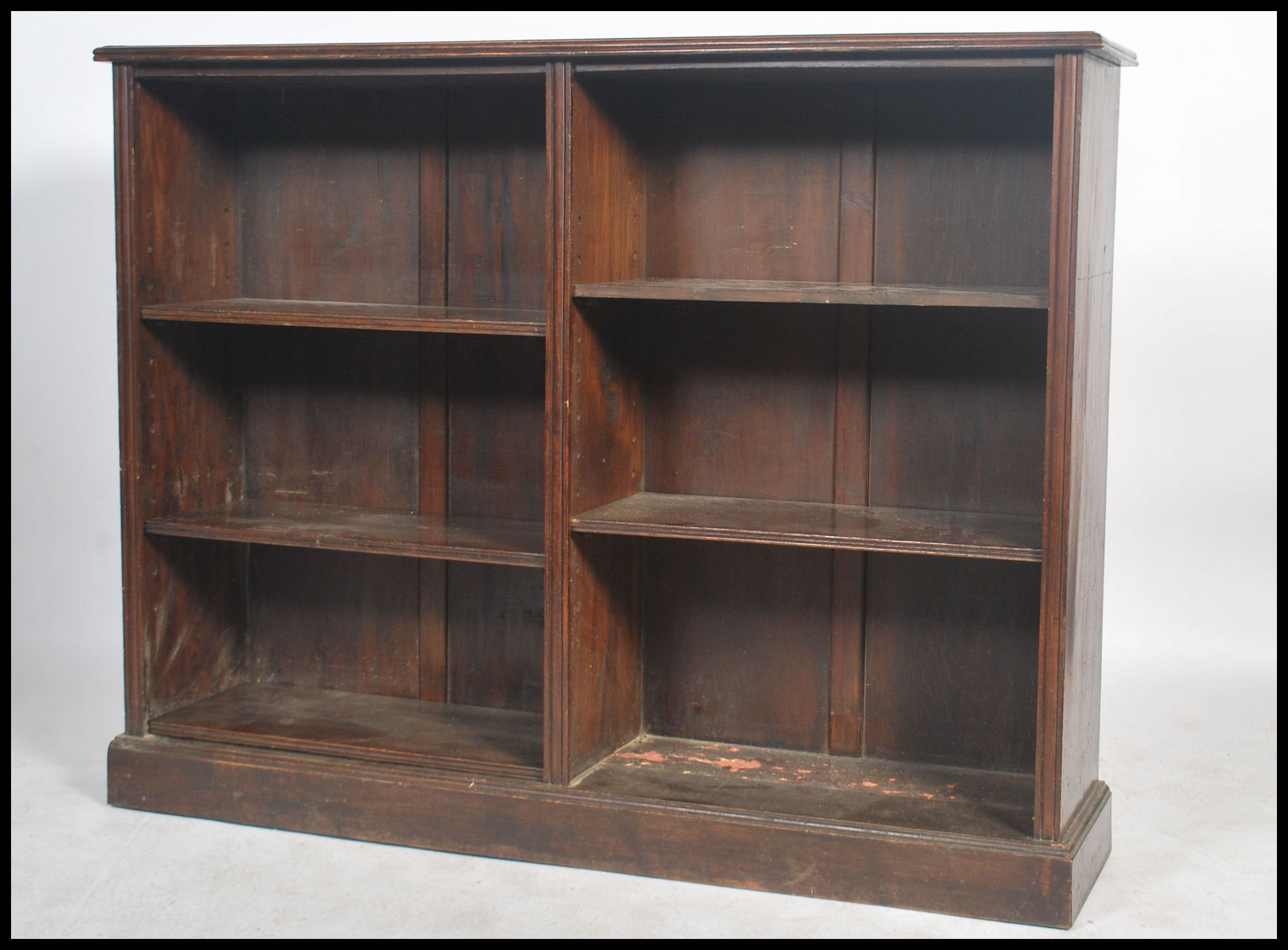 An Edwardian mahogany double open window library lawyers bookcase cabinet having a plinth base