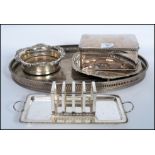 A collection of silver plated items to include a large table top cigarette box, silver plated