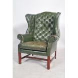 A superb 20th century, Edwardian / 1920's style full grain leather Chesterfield armchair.