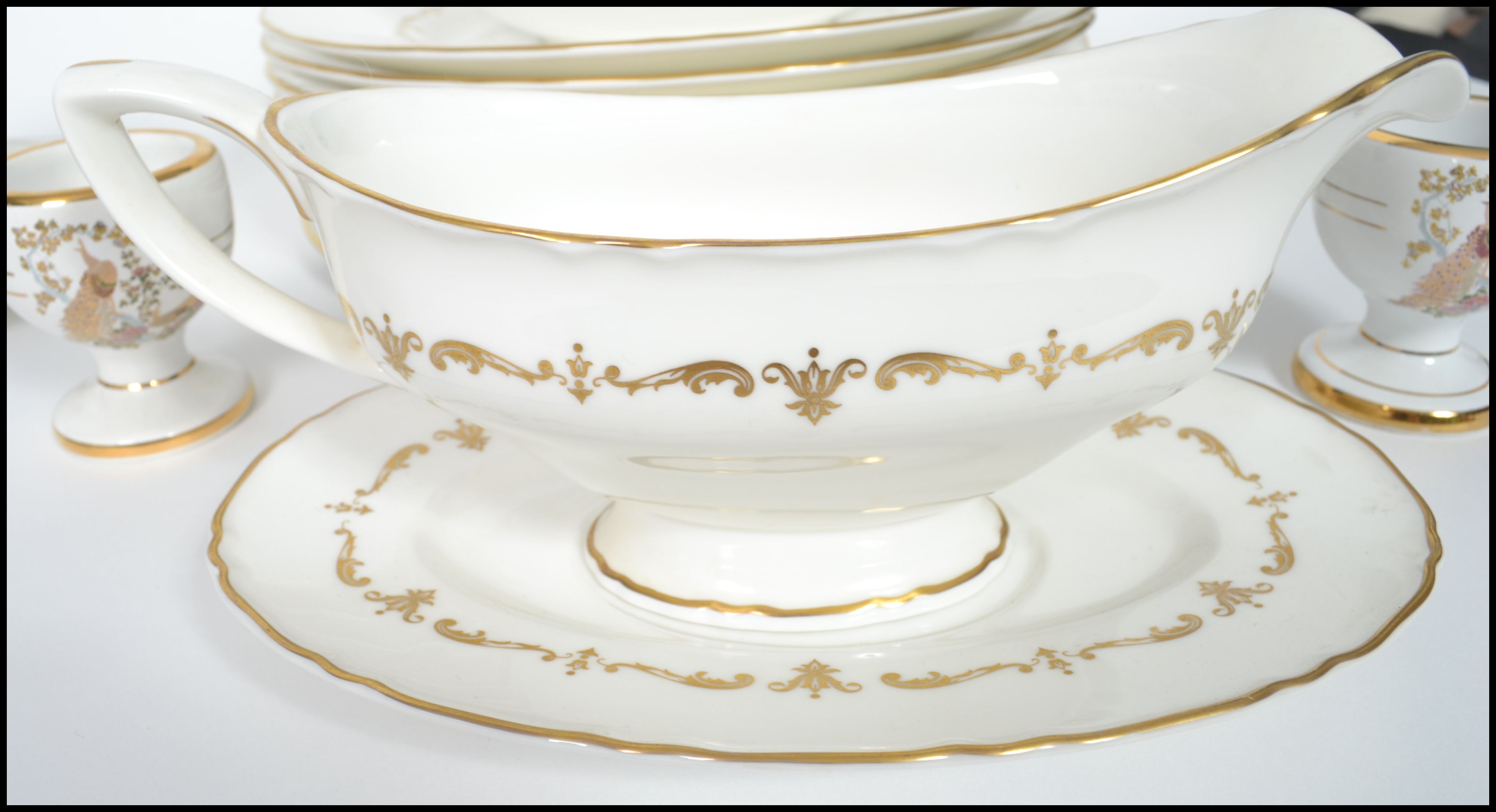 A part bone china gilt decorated on white ground dinner service by Royal Worcester consisting of - Image 6 of 9