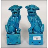 A pair of Oriental ceramic temple lion dogs of Fu