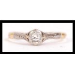 A hallmarked 18ct gold and diamond solitaire ring. Hallmarked for Birmingham, the diamond approx