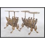 A pair of cast mid century Italian ornate ormolu side table magazine racks / plant stands side