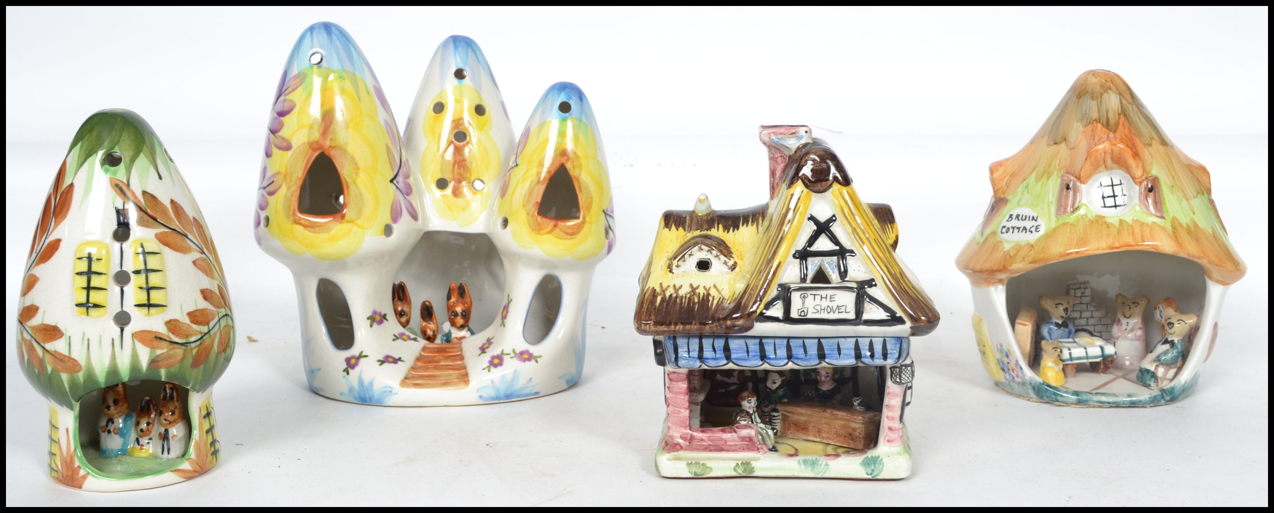 A group of three charming children's bedside night lights by Derrick Fowler together with a