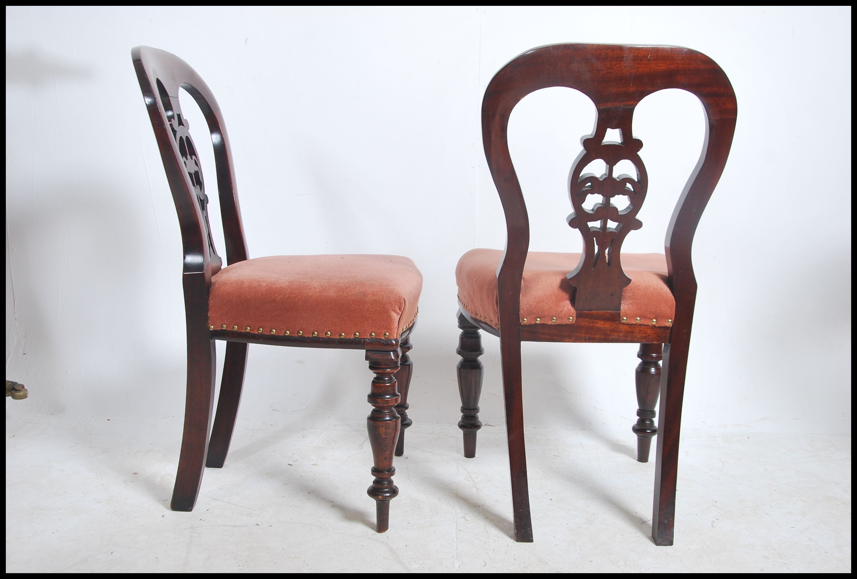 A set of 8 Regency / early Victorian mahogany balloon back dining chairs being raised on turned legs - Image 4 of 4