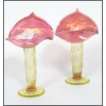 A pair of late 19th Century Stourbridge glass Jack in the Pulpit vases with wide folded cranberry