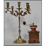 A vintage table centre brass five point candelabra together with a vintage wooden and copper