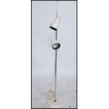 A 1980's retro adjustable twin spot chrome floor standing spot light lamp with pendant shades and