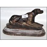 A 20th century cast bronze sculpture of a Boxer do
