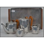 A Picquot Ware stainless steel five part tea servi