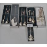 A collection of boxed German silver plated dessert