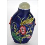 A Chinese ceramic hand painted scent bottle having