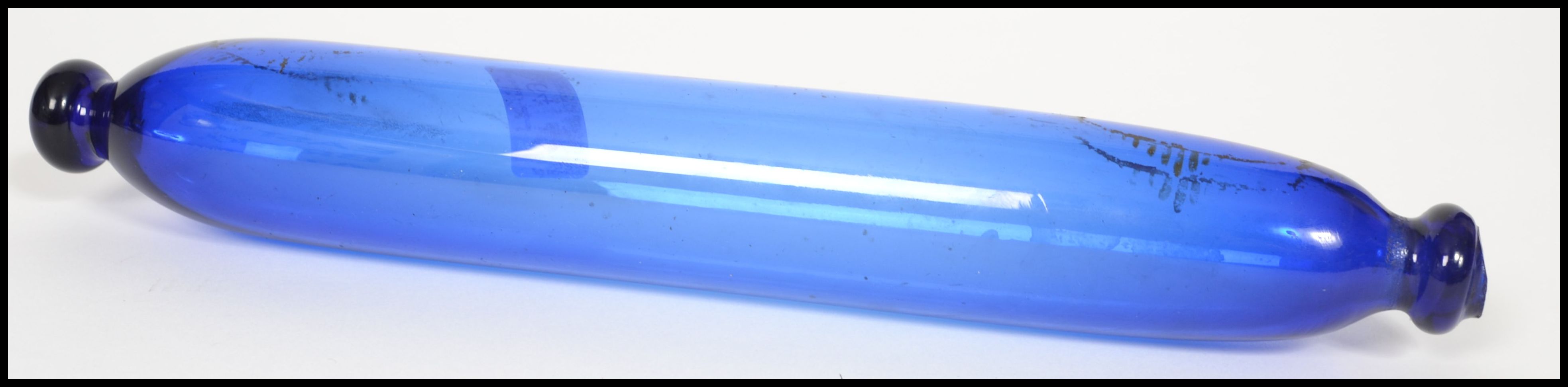 An 18th/19th century Bristol blue glass rolling pi